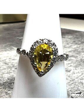 Ring Bomb Party Ring,  size 7, yellow stone, silver color band, CZ type minis
